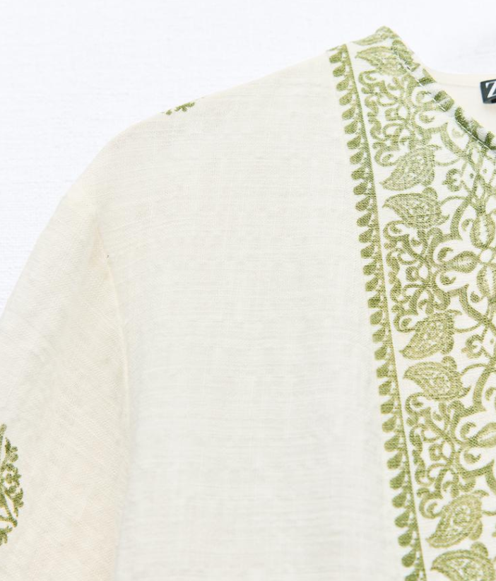 بلوزة أبيض معرقة ب أخضر